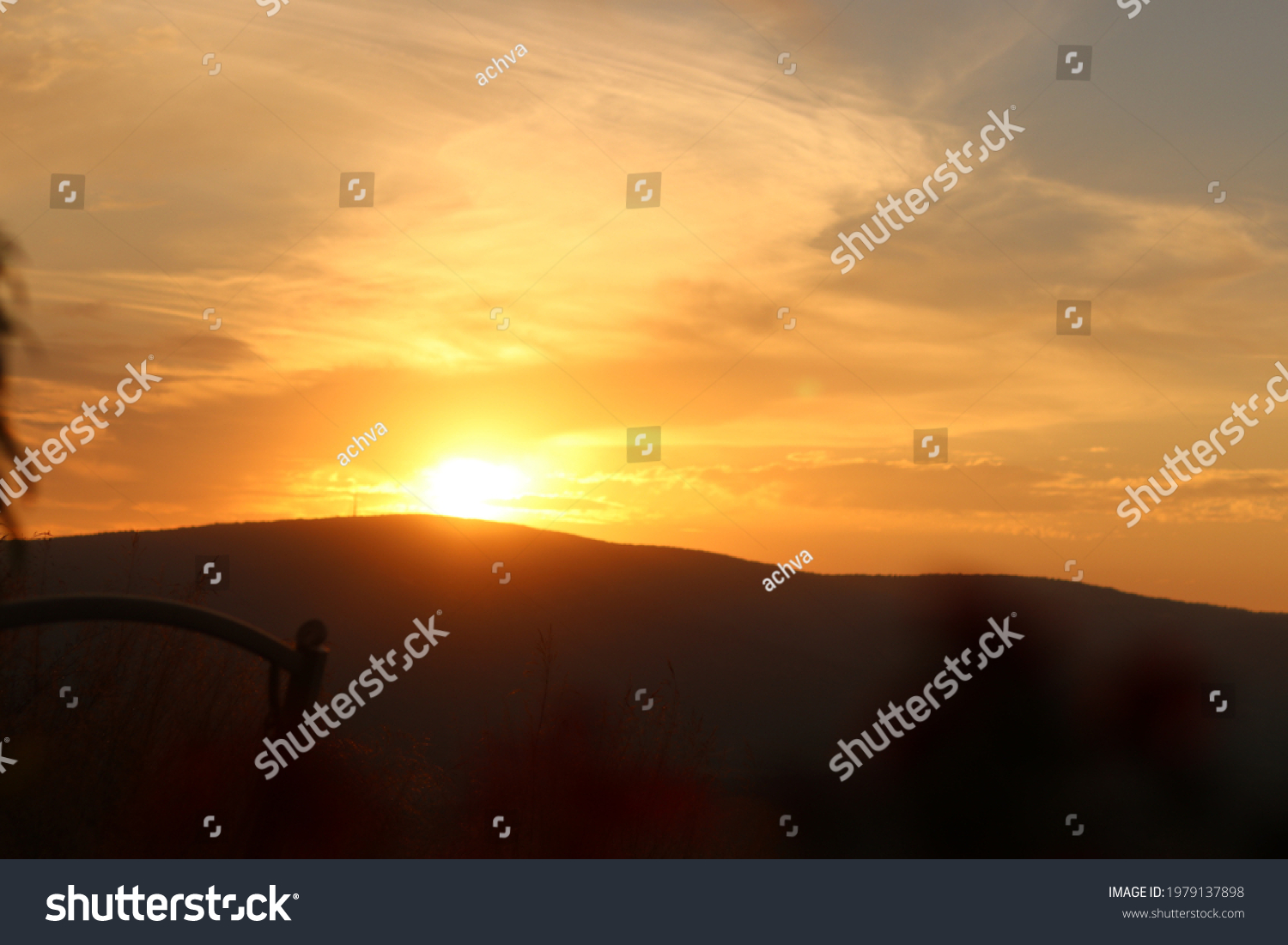 stock-photo-orange-sky-as-the-sun-sets-1979137898.jpg